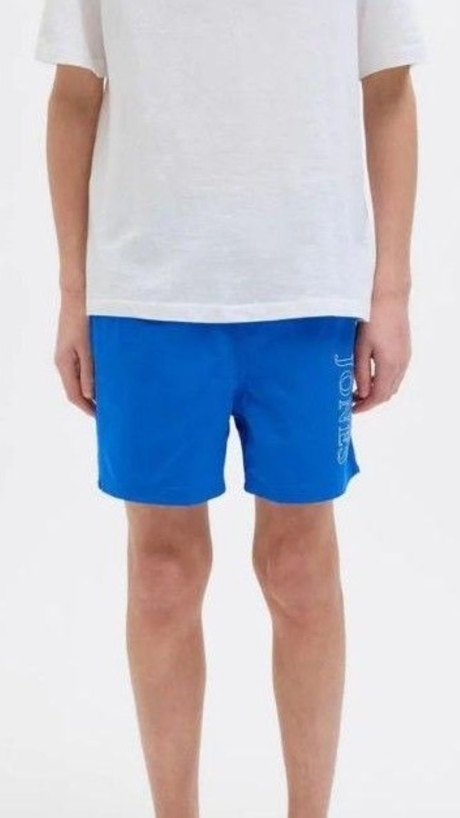 Blue quick-dry swim shorts for boys by Jack & Jones Junior
