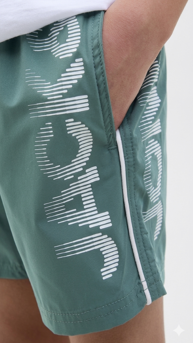 Green boys' quick-dry swim shorts, recycled swimwear for juniors
