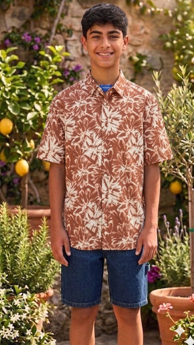 Teen wearing a patterned shirt and shorts