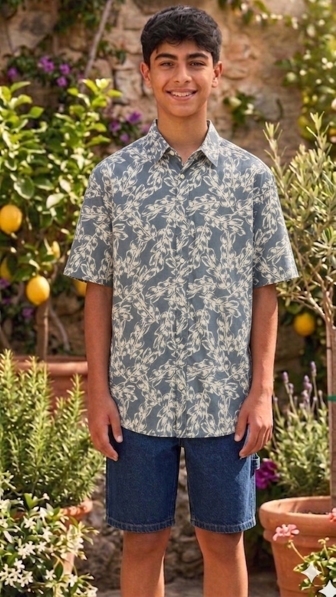 Teen wearing a floral shirt and denim shorts 